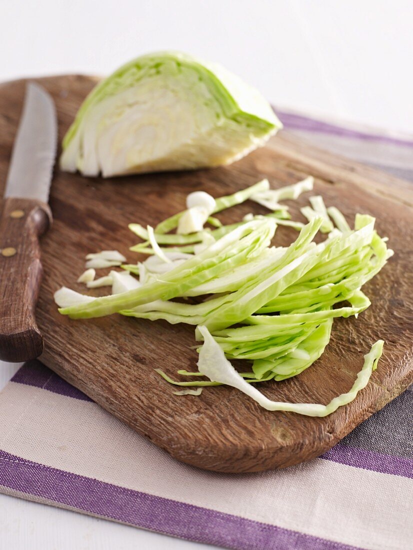 Chopped white cabbage on a chopping board