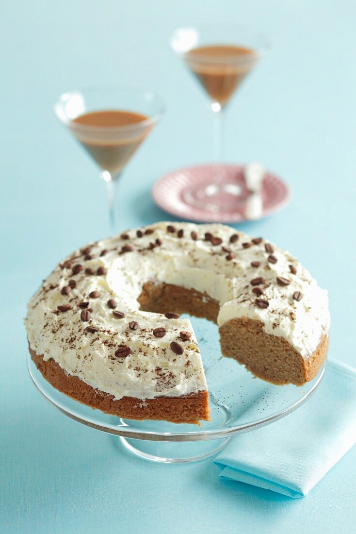 Coffee cake on cake stand, sliced