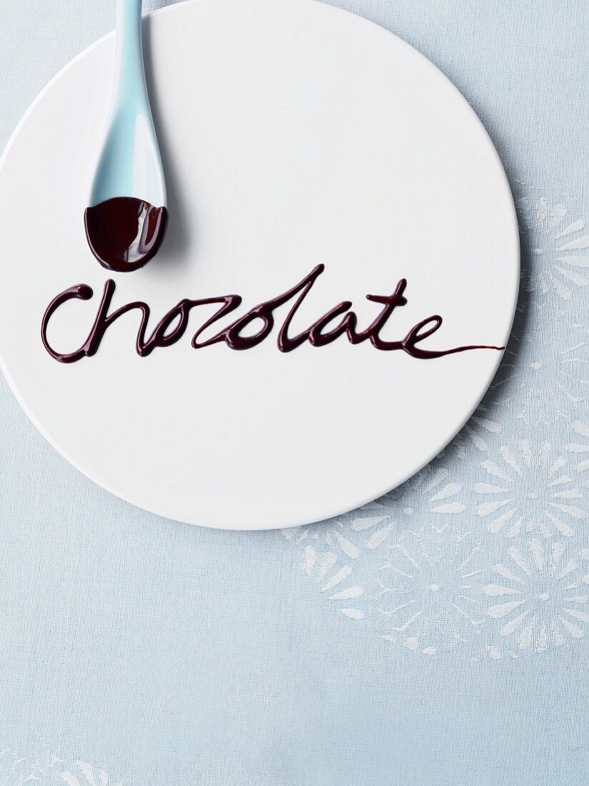 The word 'chocolate' written on a plate