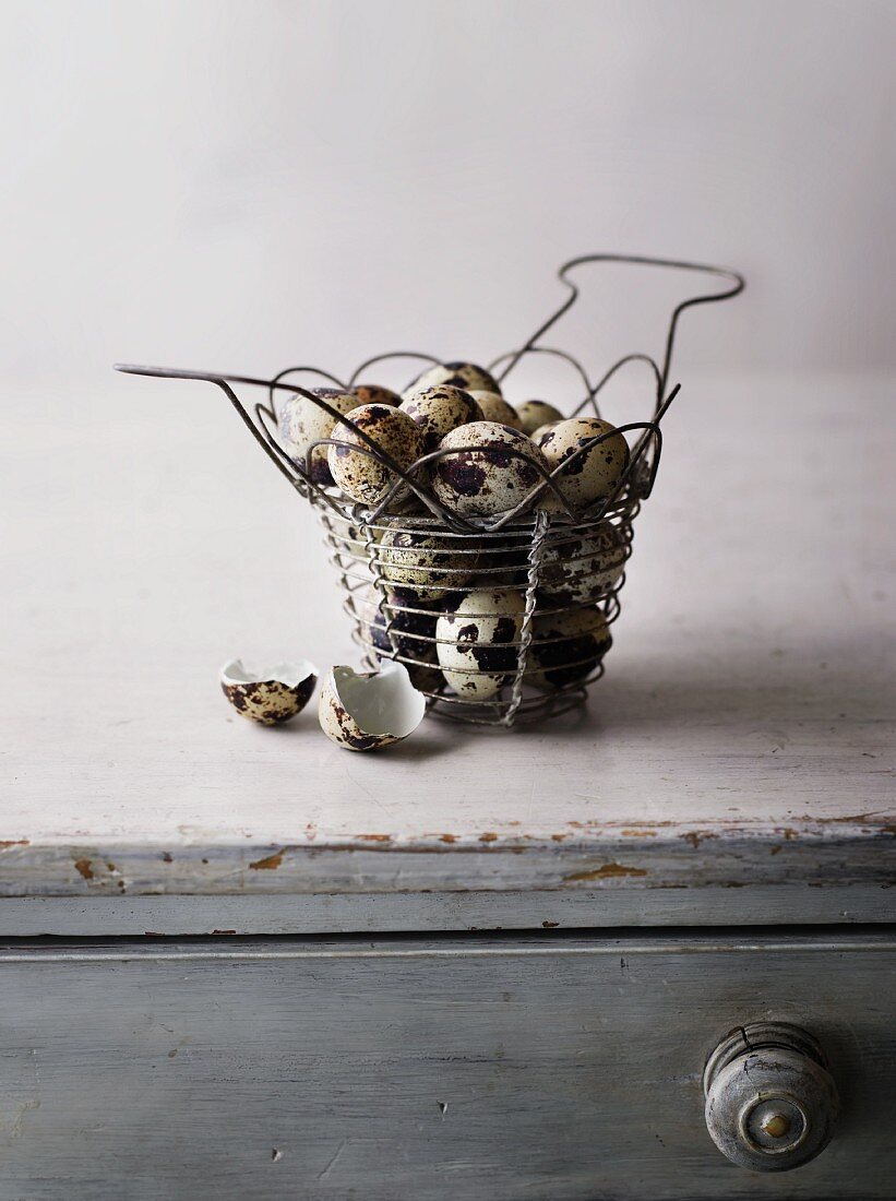 Quail's eggs in a wire basket