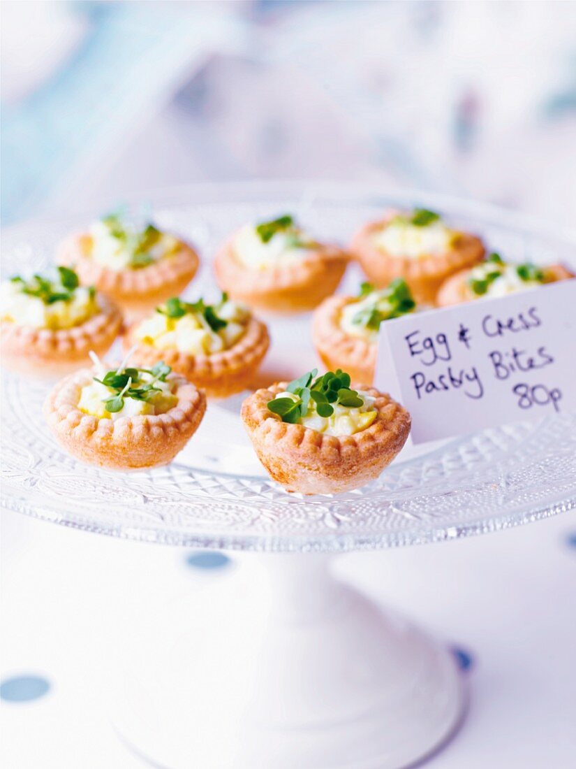 Canapes with egg and cress on a cake stand