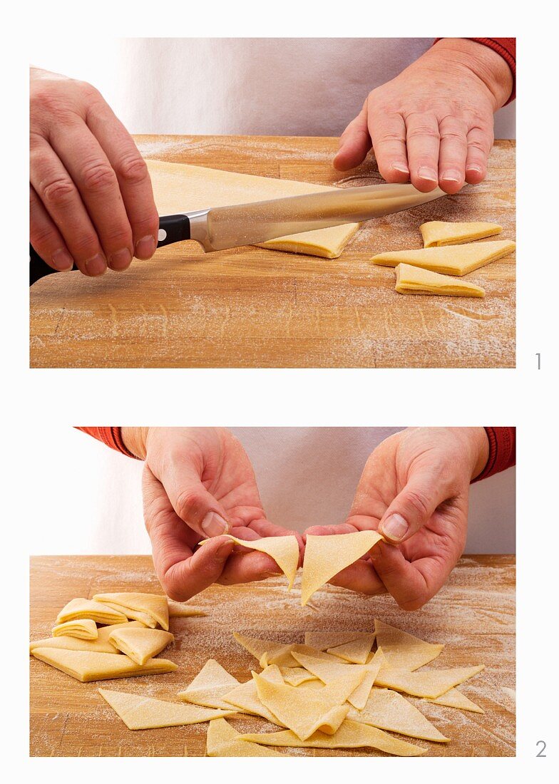 Pasta dough being cut into maltagliati