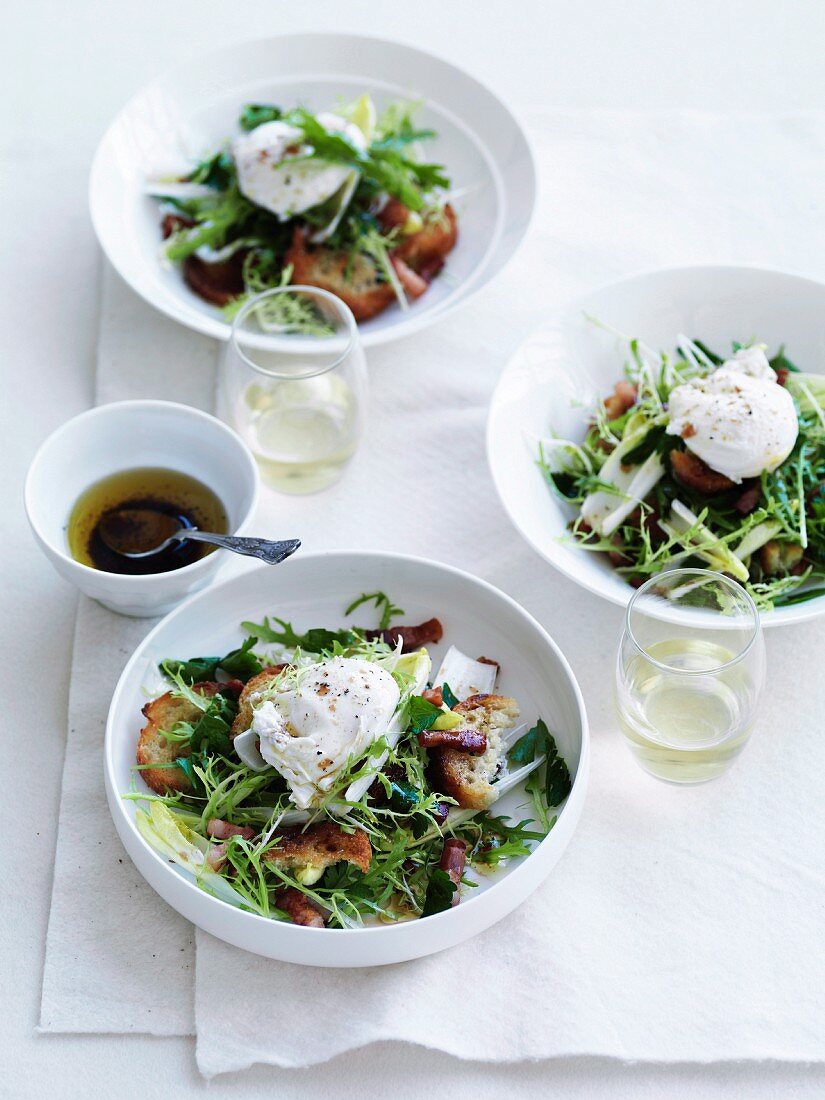 Salade Lyonnaise (salad with poached egg, bacon and croutons)