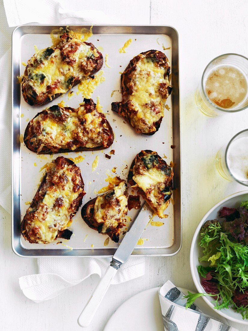 Toast topped with aubergine chutney and provolone