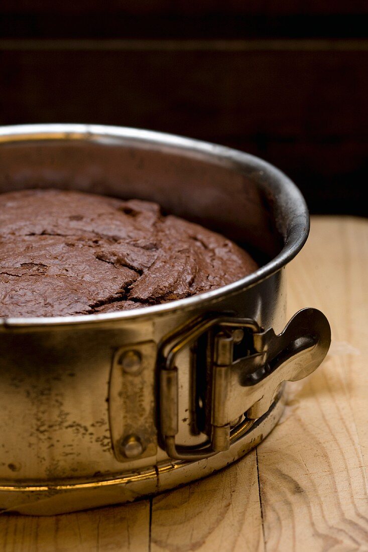 Chocolate cake in a cake tin
