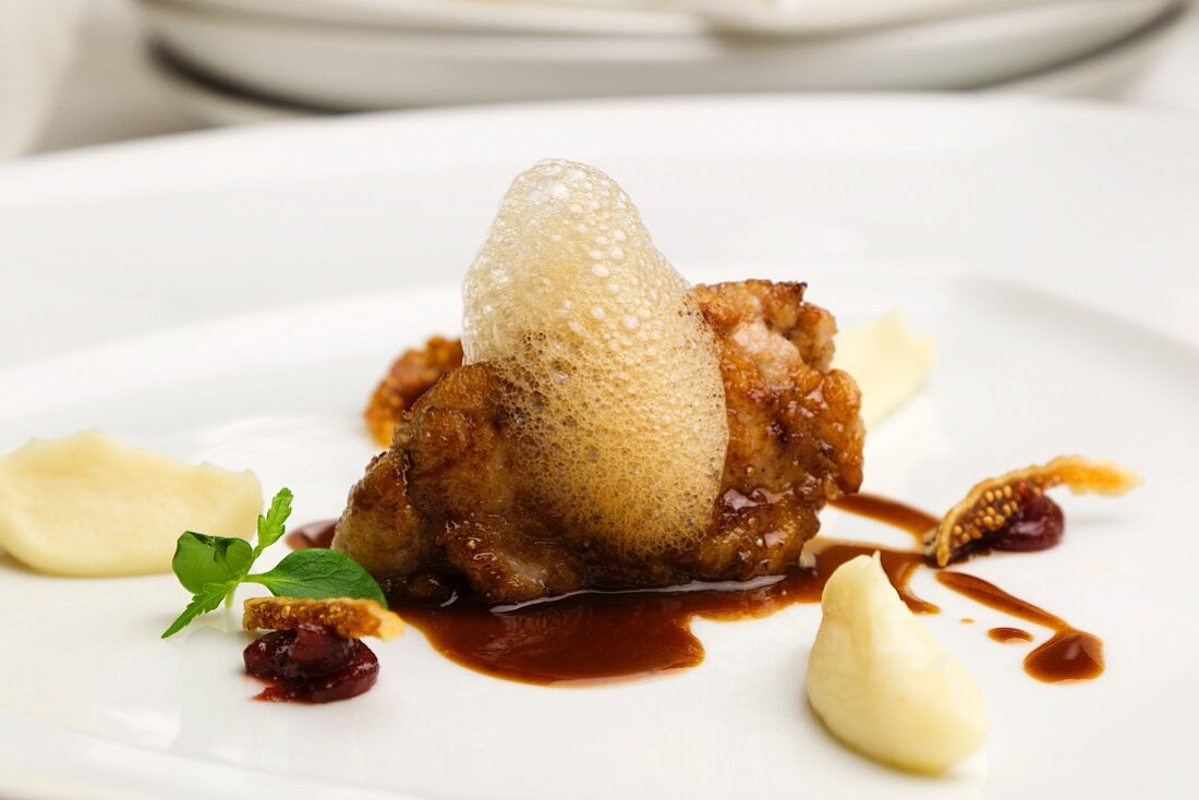 Veal sweetbreads with nougat sauce, mashed potatoes and coffee foam