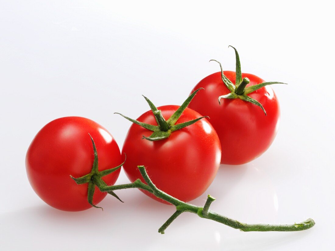 Three red tomatoes