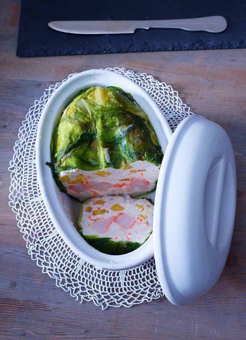 Prawn terrine with wasabi and mango in lettuce leaves