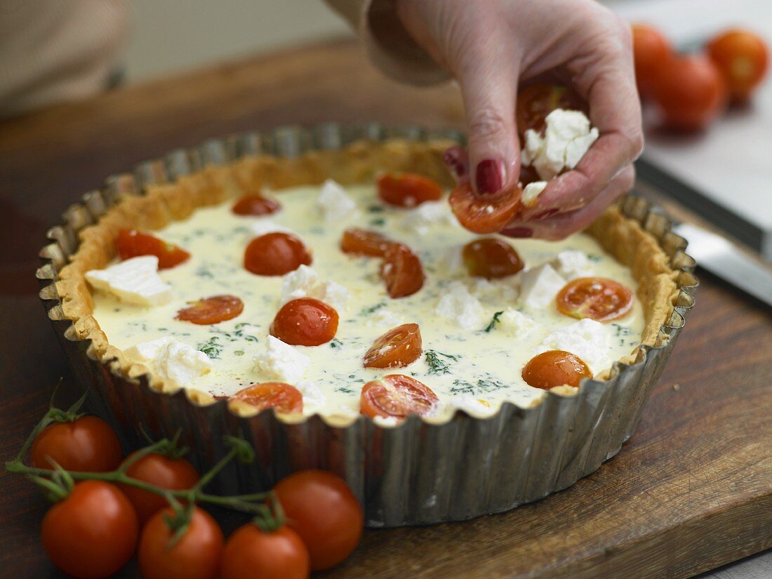 Tomato quiche being made