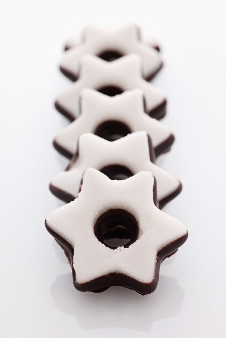 A row of iced star biscuits