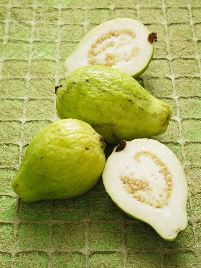 Guavas, whole and halved