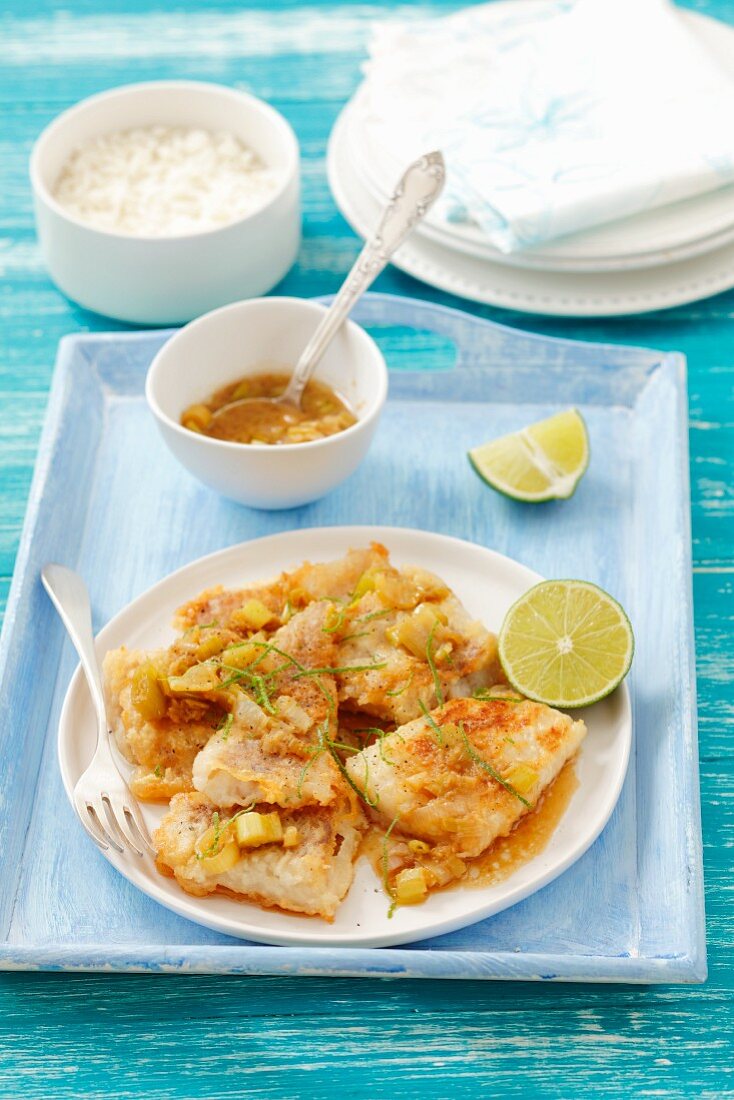 Fried cod with garlic, ginger and limes