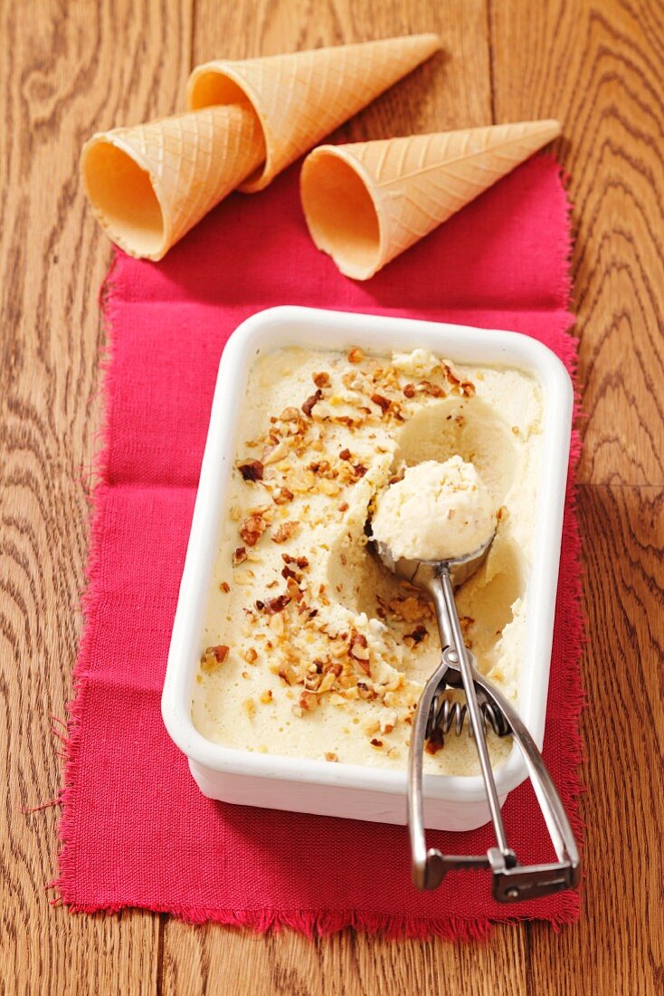 Cheese ice cream (Roquefort) with walnuts and ice cream cones