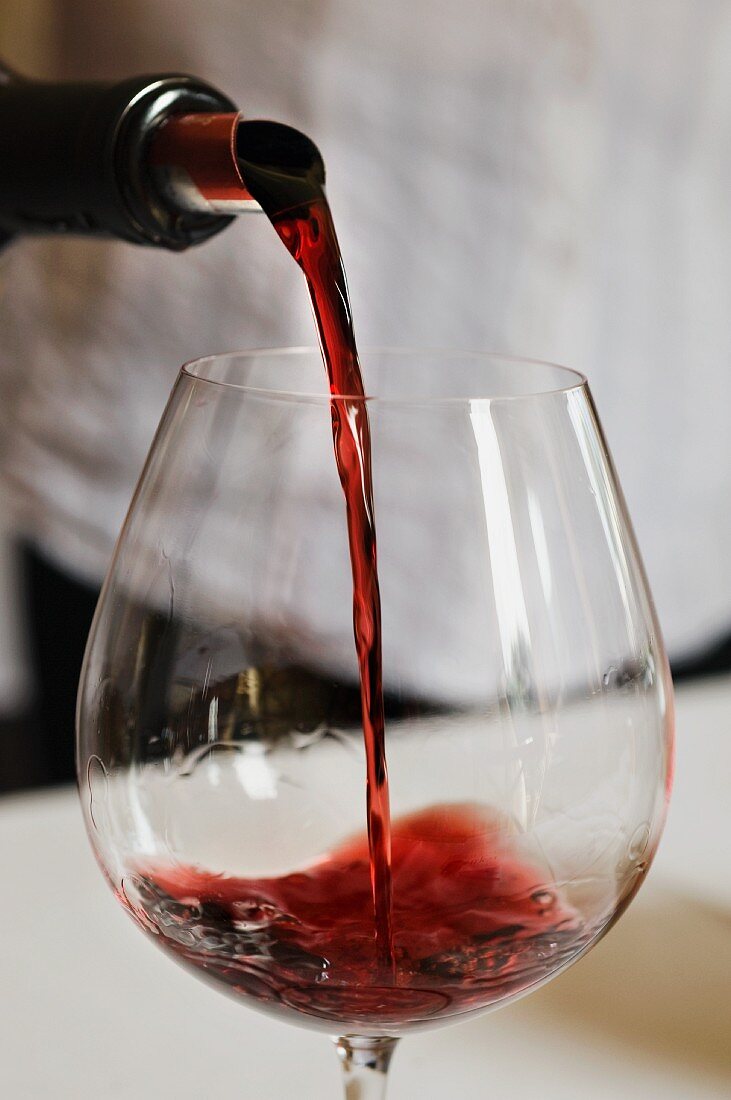 Pinot noir being poured
