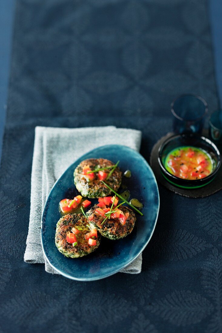 Spinach and ricotta burgers with a pepper vinaigrette