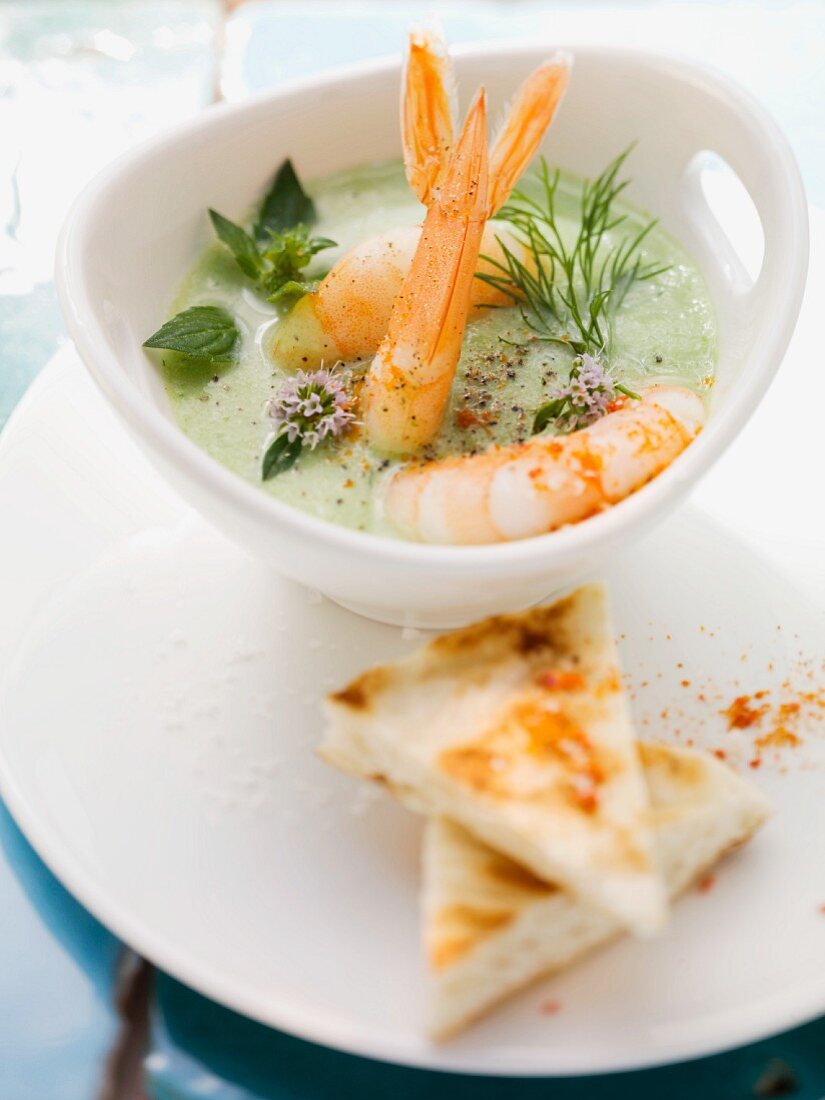 Yogurt and herb soup with king prawns