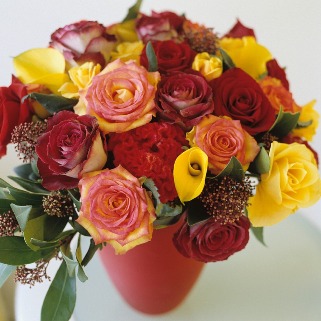 Hand-tied bouquet of roses in pink and yellow