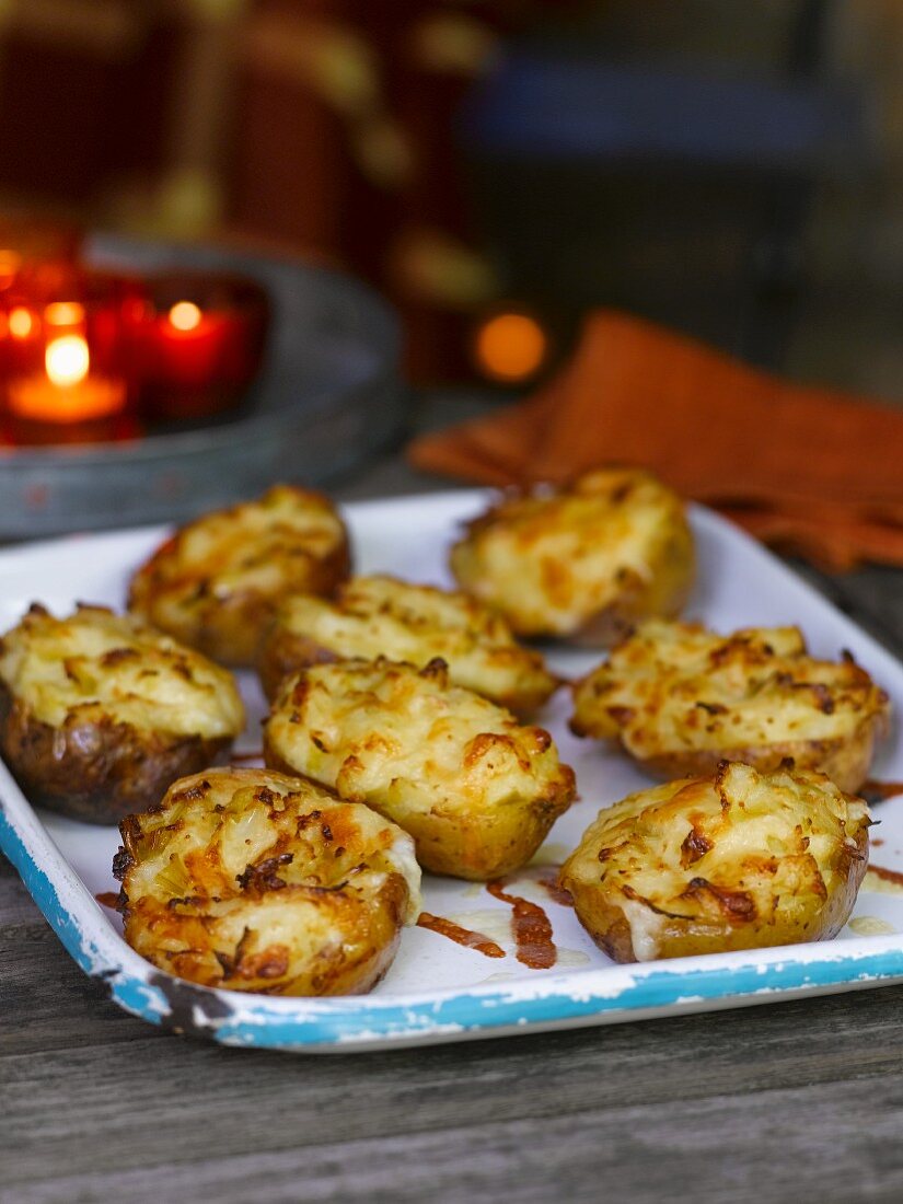 Baked potatoes topped with cheese