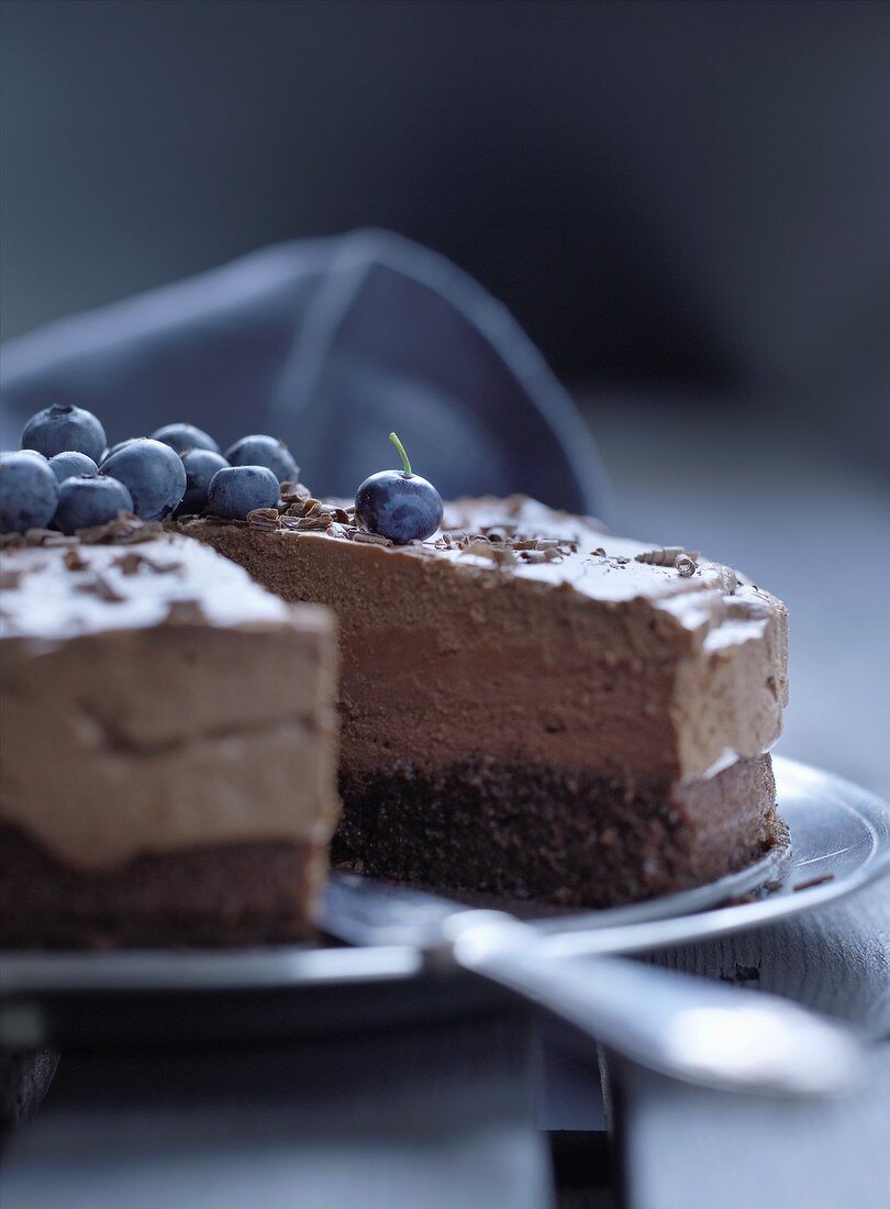 Chocolate cream cake with blueberries