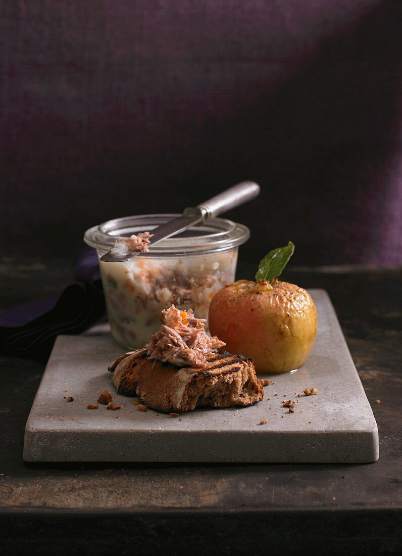 Goose rillette on bread with a baked apple
