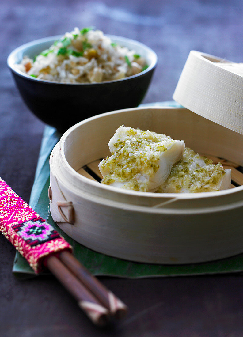 Steamed fish fillet in bamboo baskets with rice salad