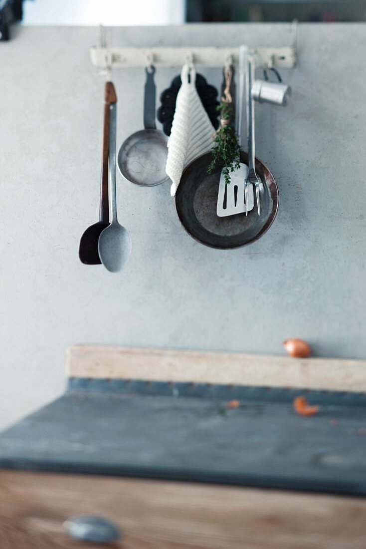 Kitchen utensils hanging on a wall