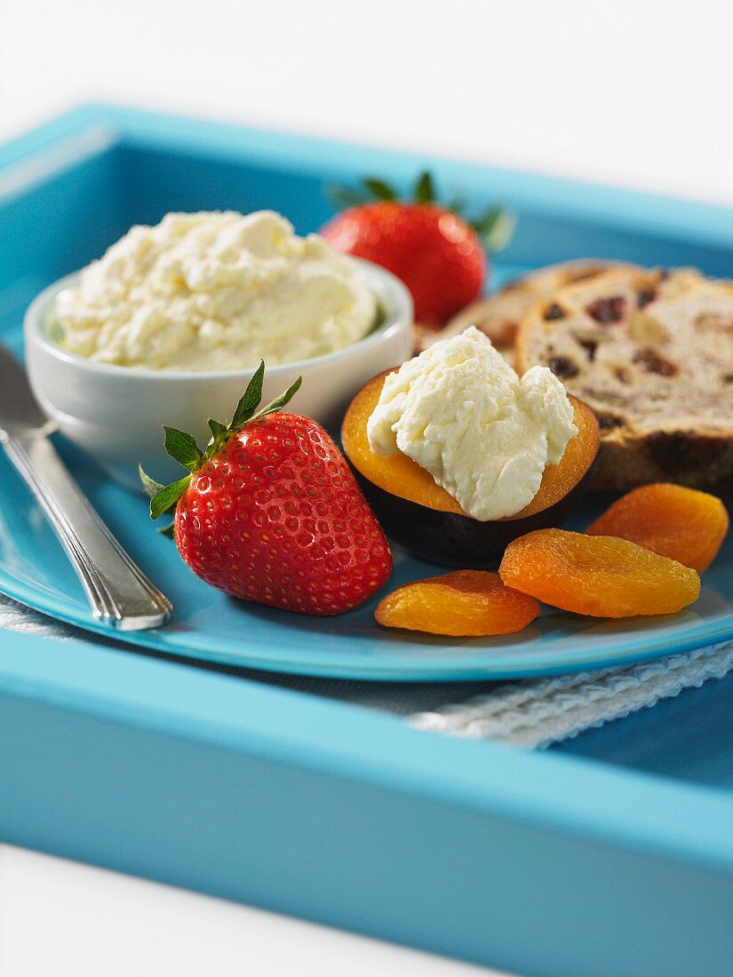 Cream cheese with fruit and raisin bread