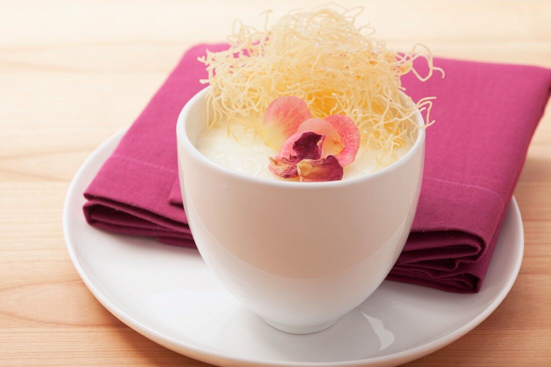 Rice pudding with rose petals and angel's hair pasta