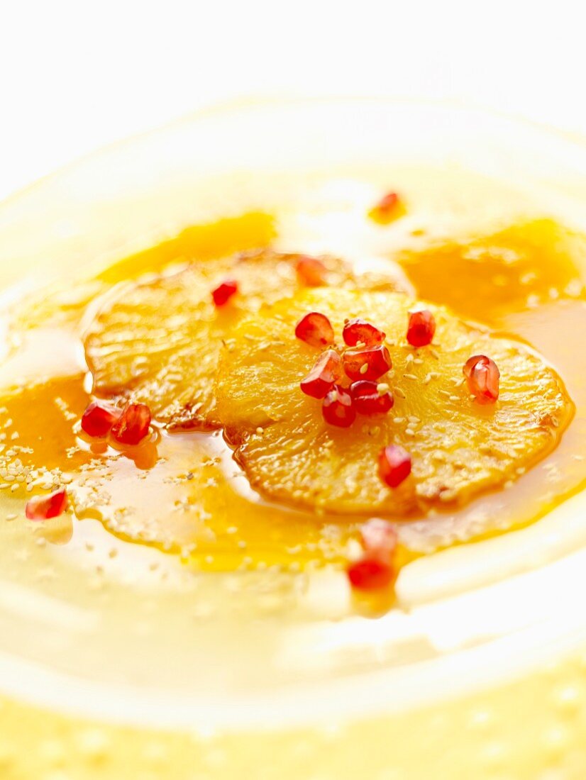 Pineapple dessert with pomegranate seeds