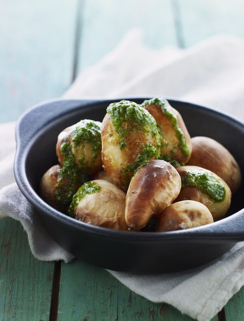 Baked potatoes with pesto