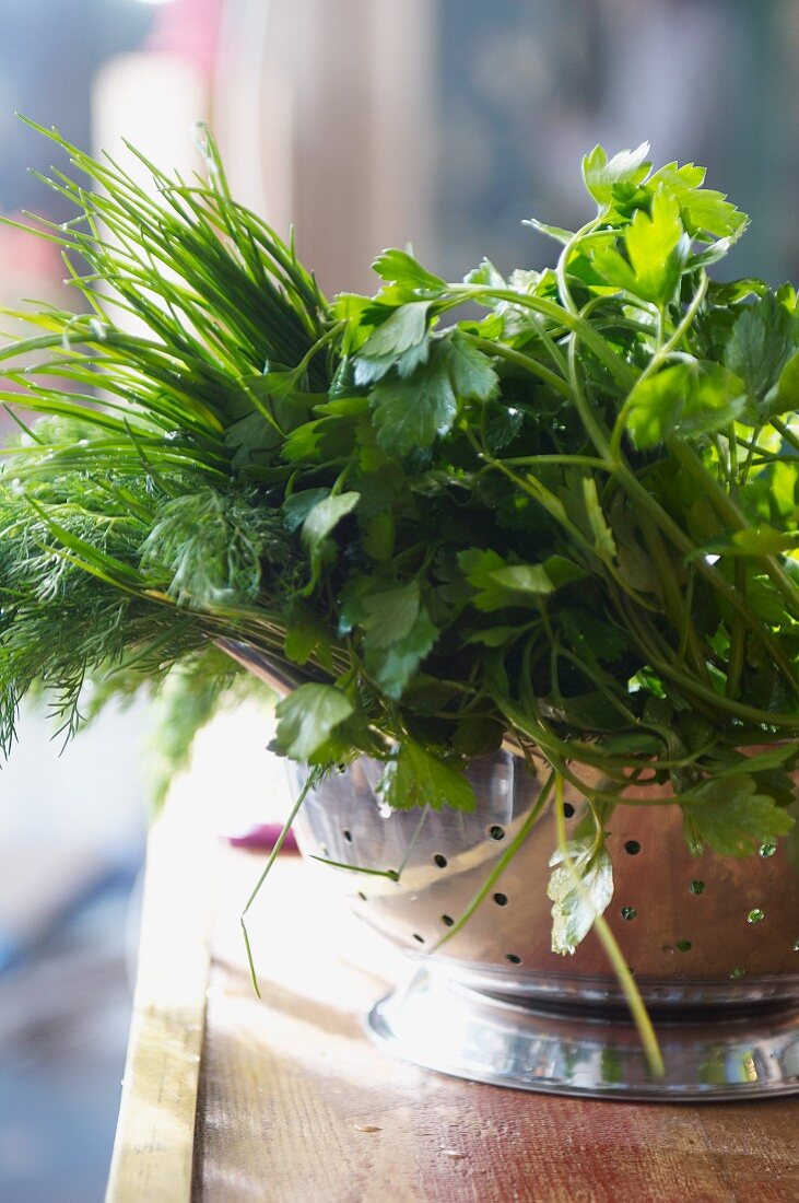 Fresh herbs in a colander