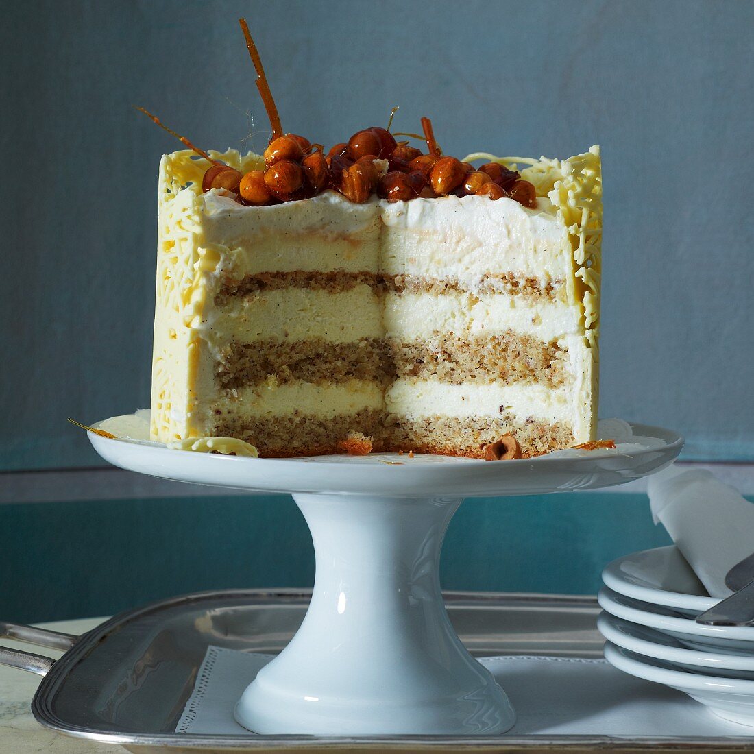 Vanilla mousse layer cake with caramelised hazelnuts