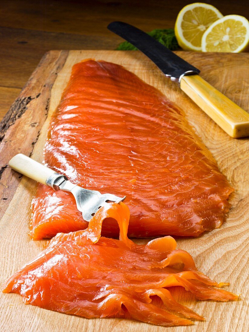 Smoked salmon on a wooden board