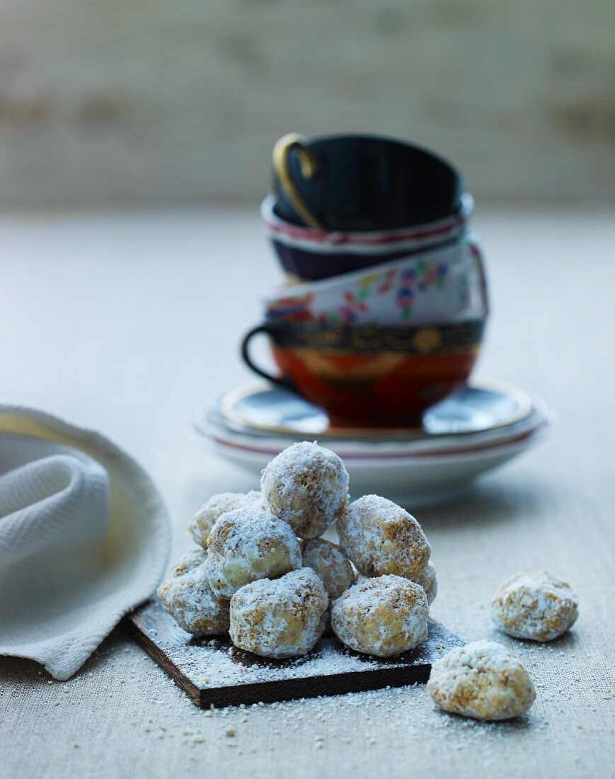 Christmas cakes and a stack of teacups