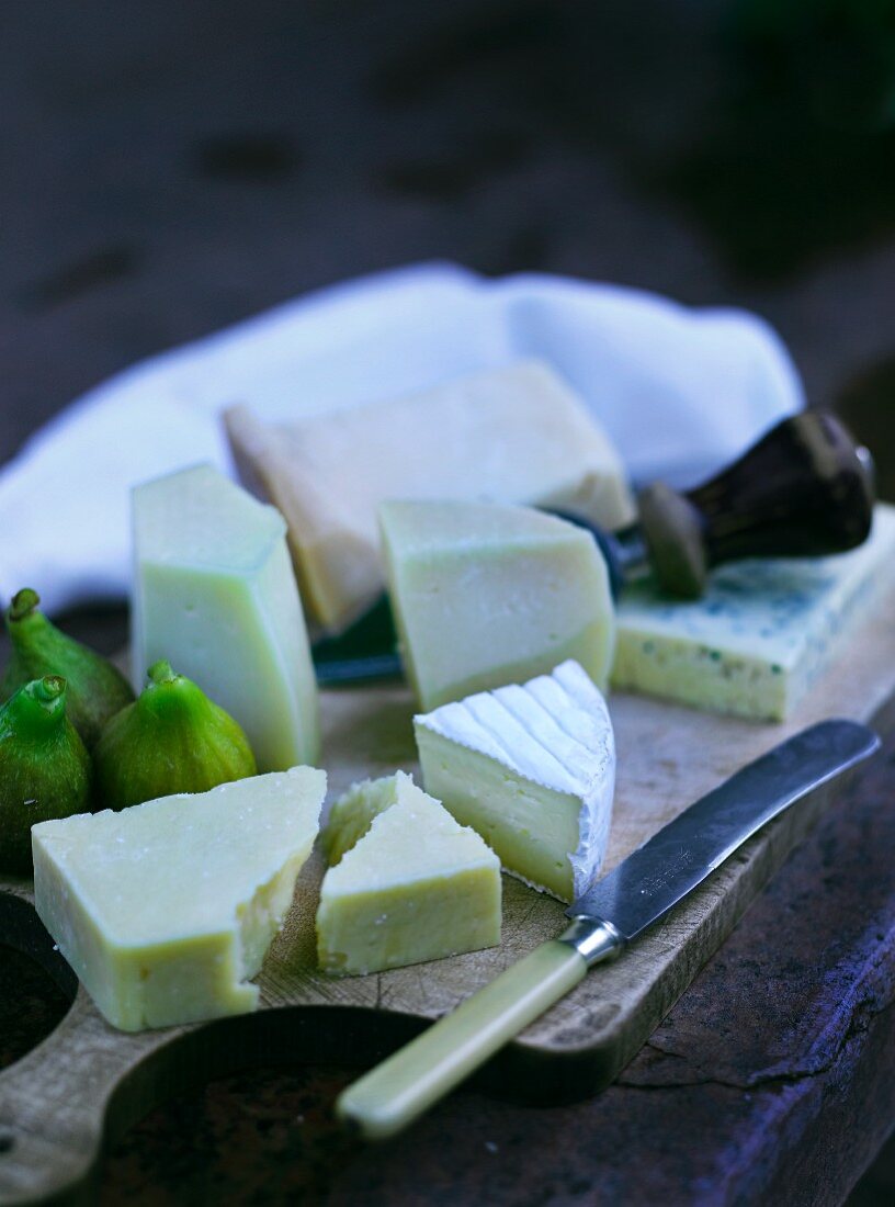 Various Cheese on Wooden Breadboards