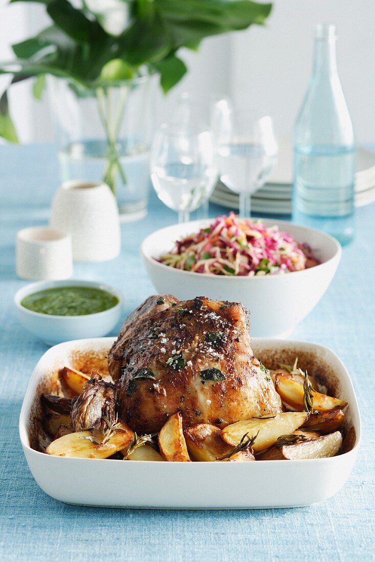 Roast lamb with potatoes, mint sauce and a cabbage salad