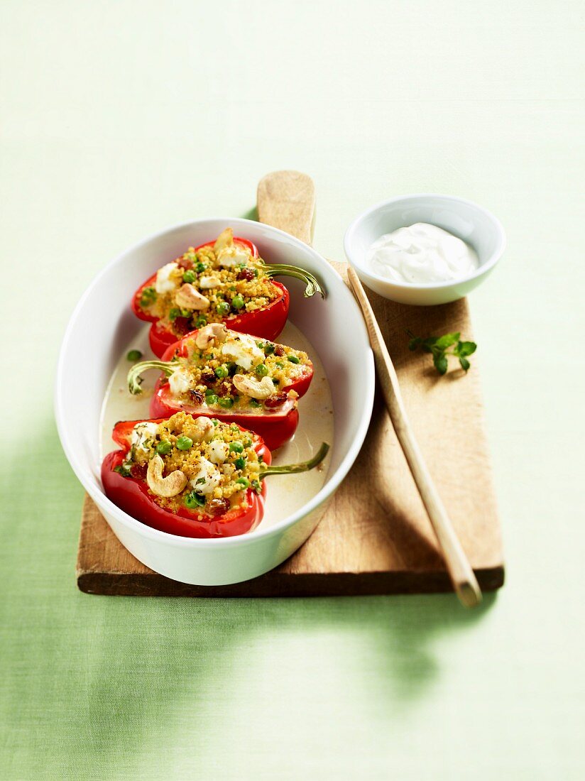 Pepper halves filled with couscous and cashew nuts