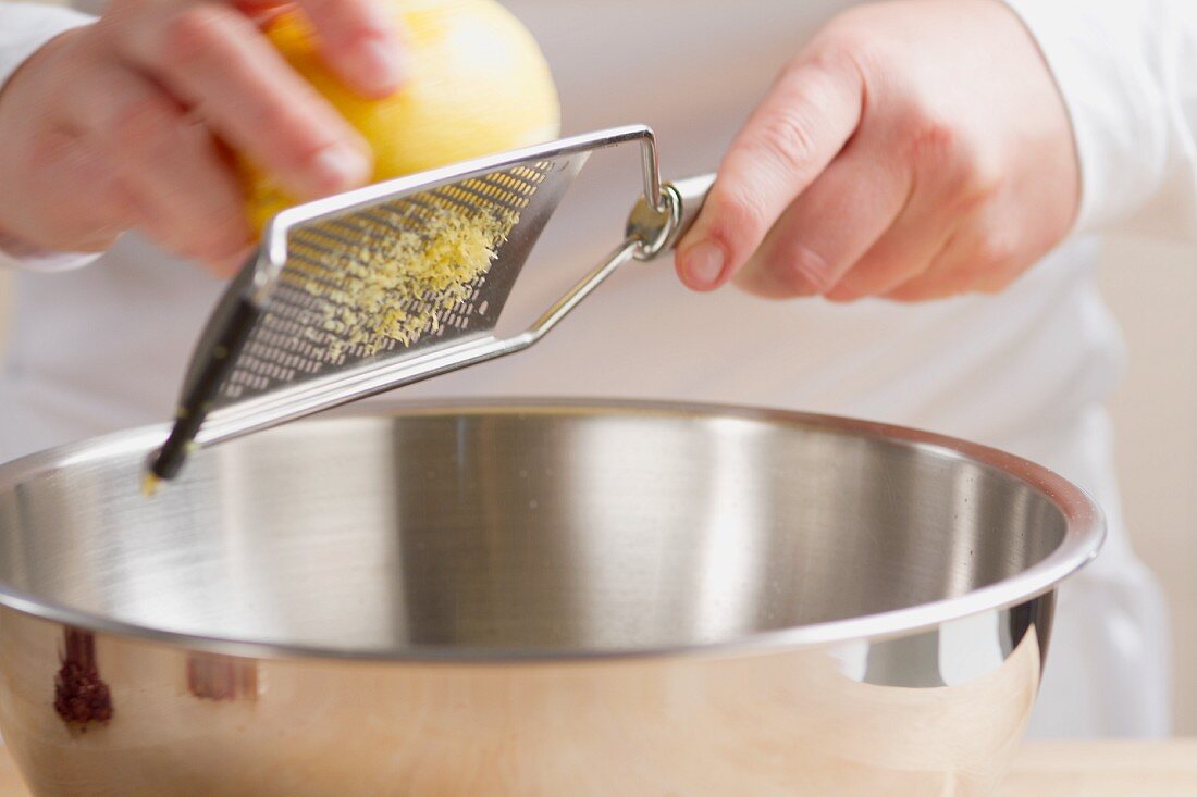 Lemon zest being grated