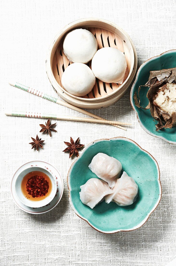 Dim Sum; Custard Filled Steamed Buns, Sticky Rice in Lotus Leaf and Shrimp and Chive Dumpling