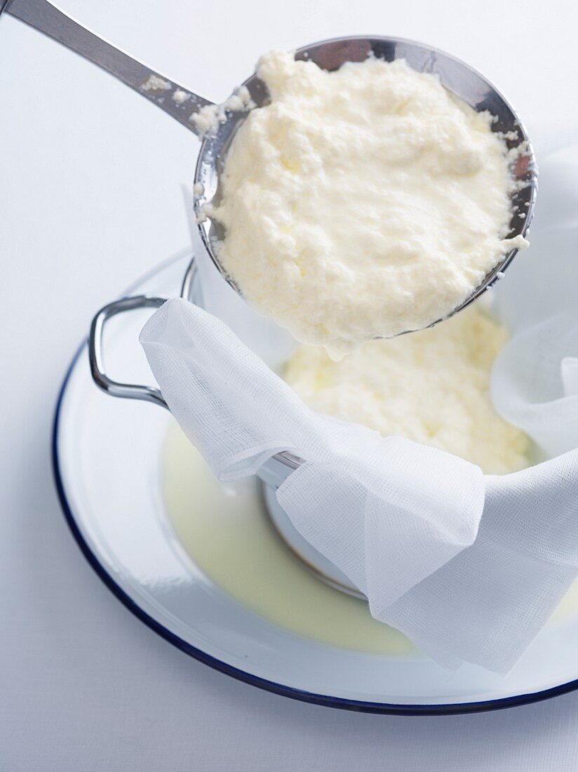 Ricotta being made