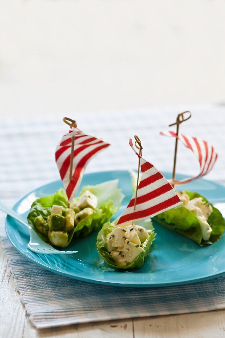 Lettuce leaf boats filled with avocado and egg salad