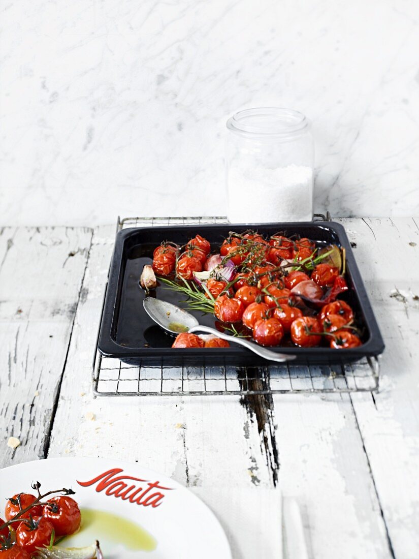 Braised cherry tomatoes on a baking tray