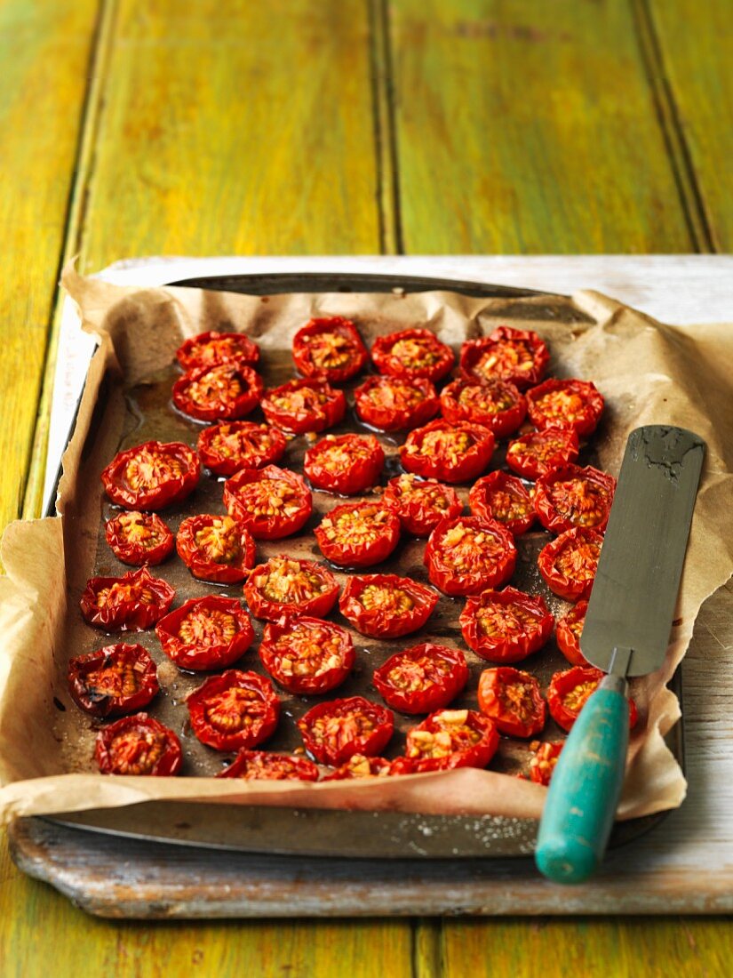 Roasted tomatoes on a baking tray