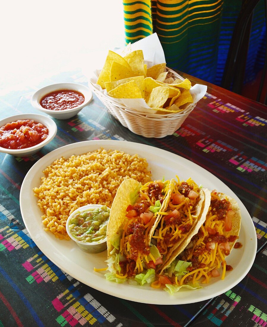 Hard Shell Tacos with Guacamole and Mexican Rice; Chips with Salsa