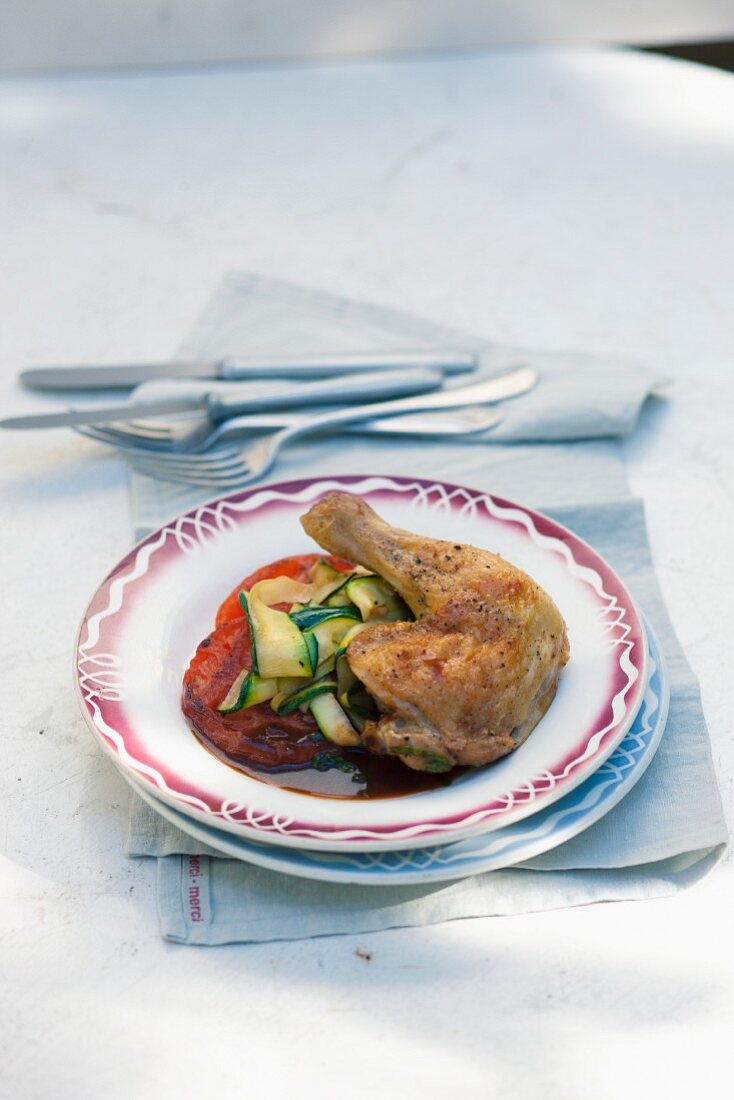 Spring chicken with courgettes and tomatoes