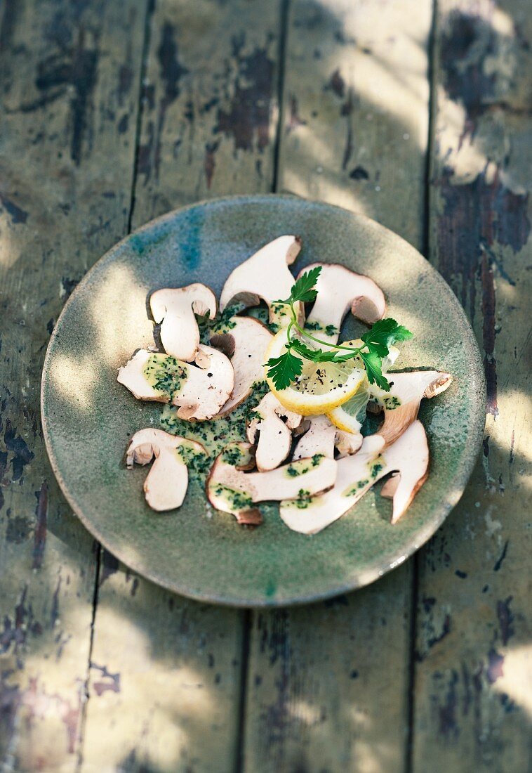 Porcini mushroom carpaccio with a parsley and lemon dressing