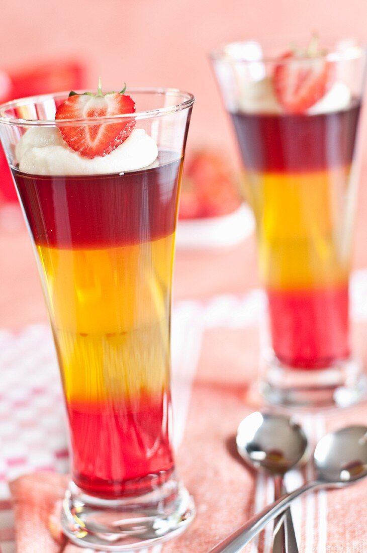Layered jelly with cream and strawberries