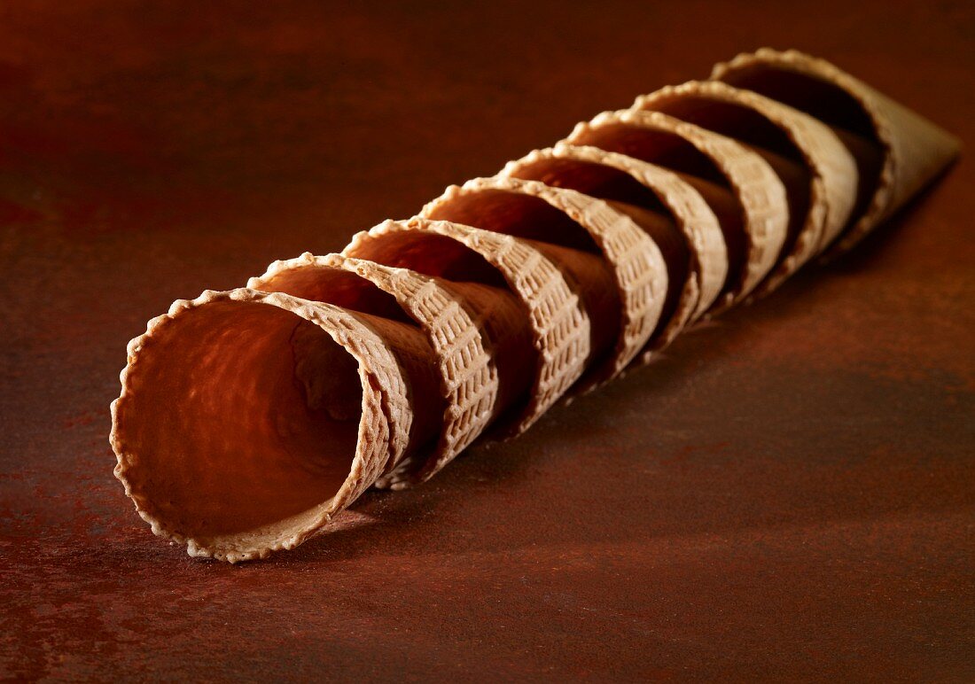 A stack of ice cream cones lying down