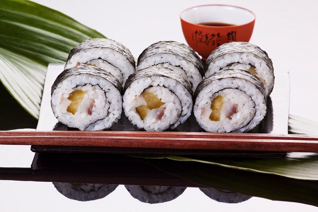 Maki sushi with herring and gherkins