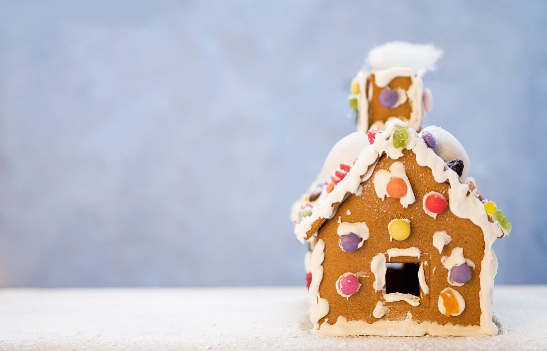 A gingerbread house decorated with sweets